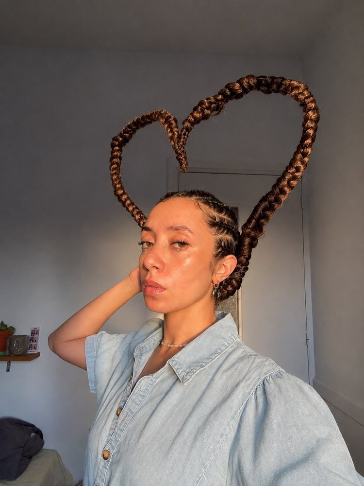 Sculptural braid forms arranged as an art piece